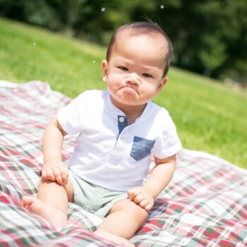peaceful parenting, baby mad outside on picnic blanket