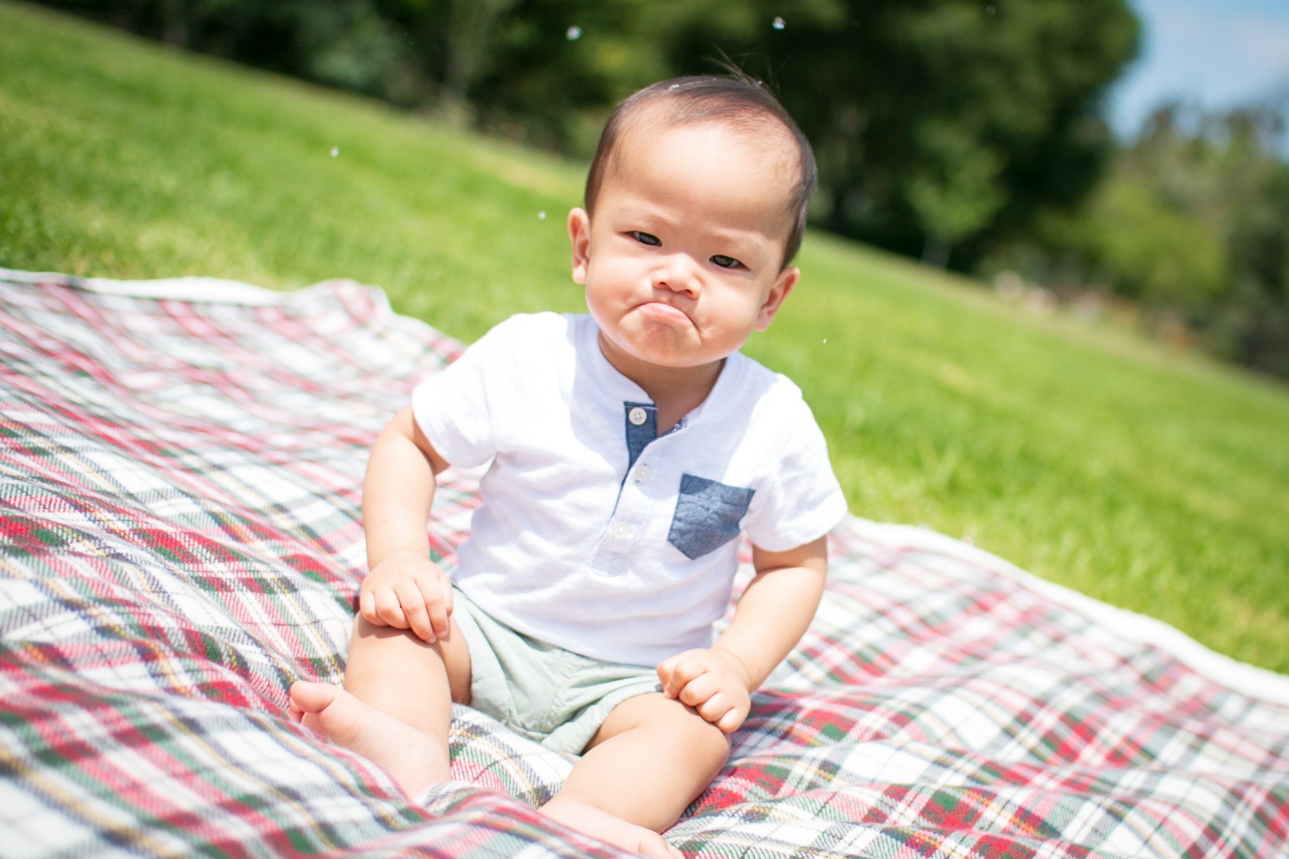 peaceful parenting, baby mad outside on picnic blanket